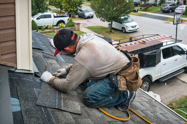 Professional Storm Damage Roof Repair technician working in Waverly, NY